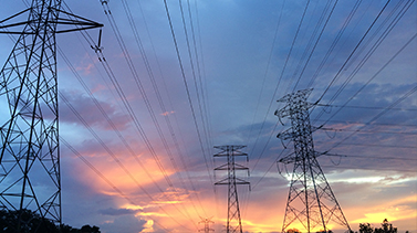 Powerlines with the sunset in the background